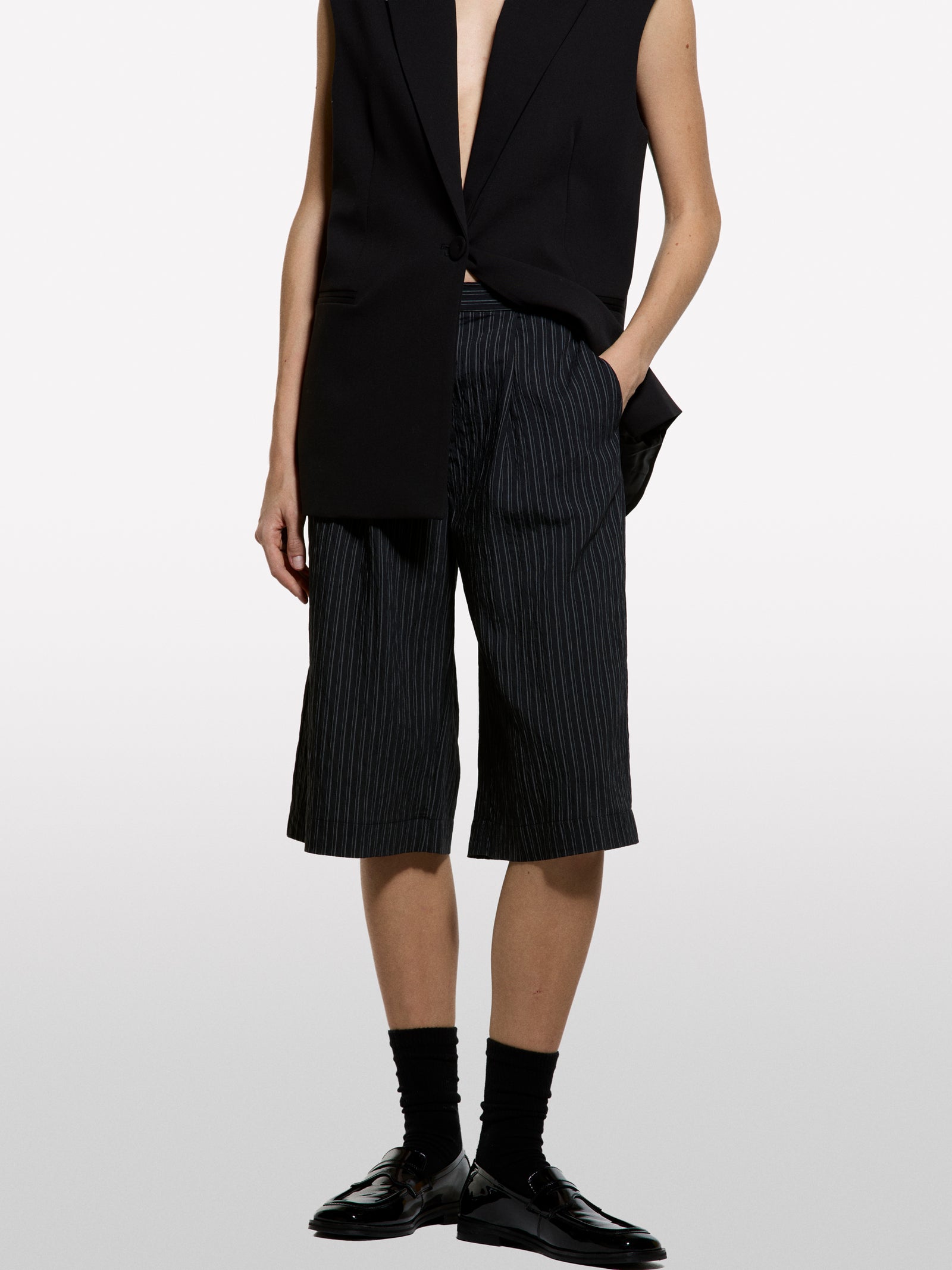 Black striped bermudas