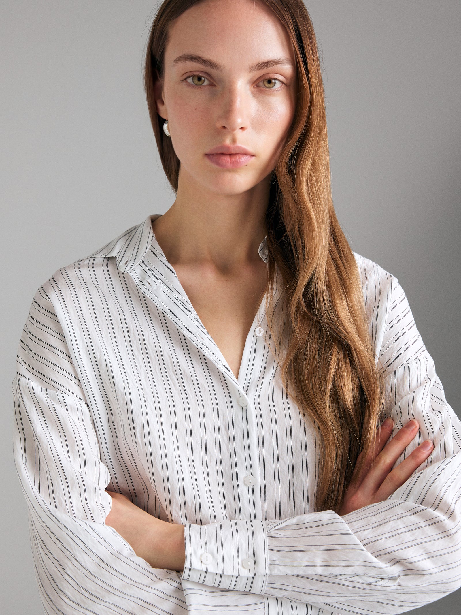 Striped shirt with buckle