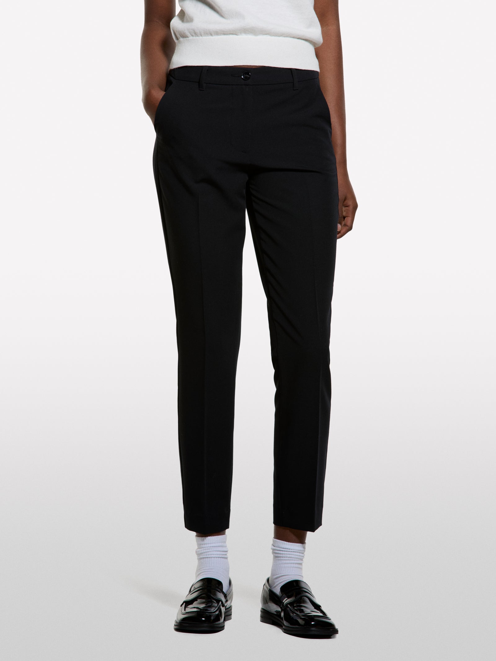 Black cigarette trousers